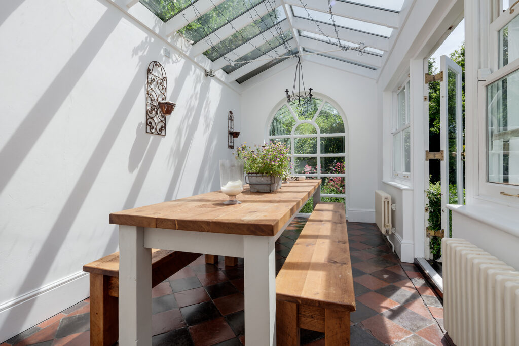 Cambridge, England - June 6 2018: Stylish Sunlit Dining Room Con