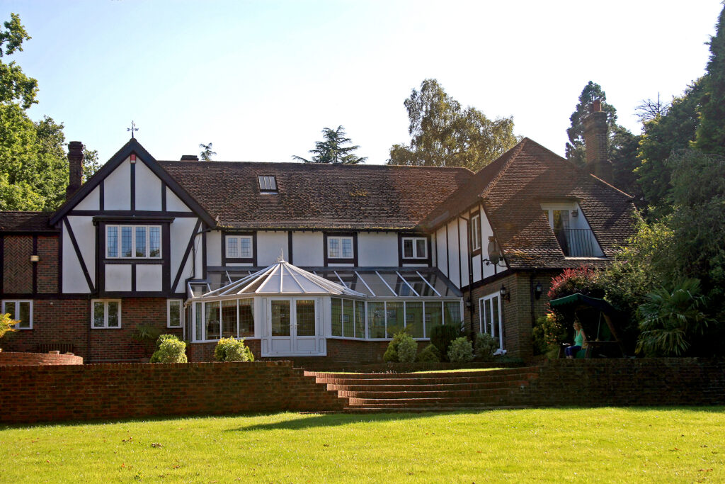 hardwood orangery - large estate home Tudor style in the UK