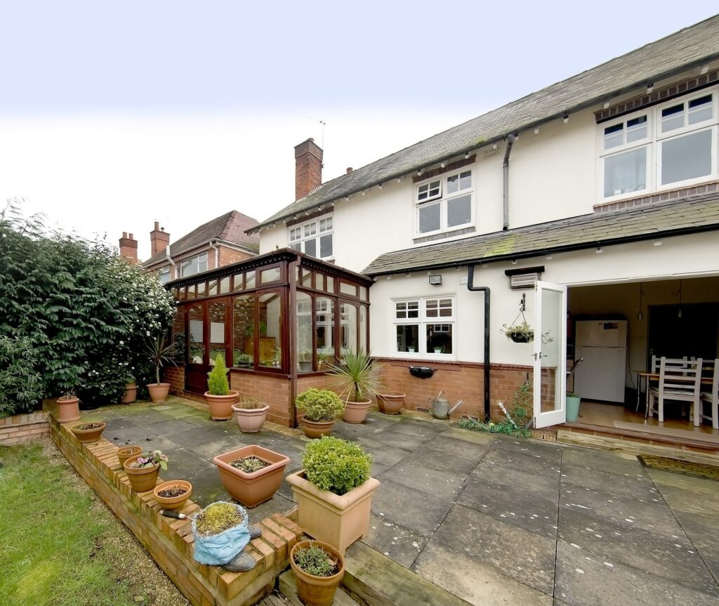 wooden conservatories - detached house with conservatory